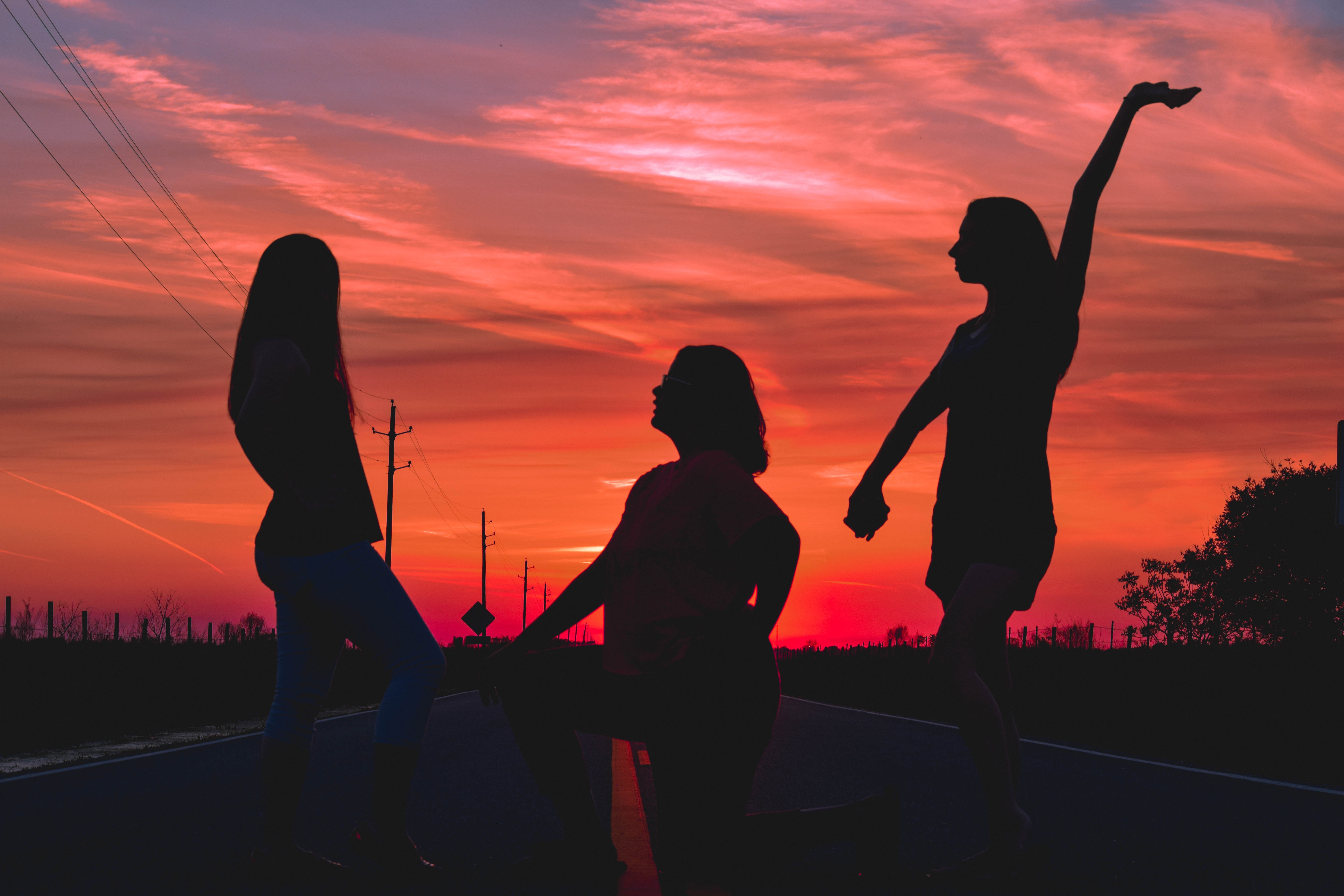 Three friends at sunset